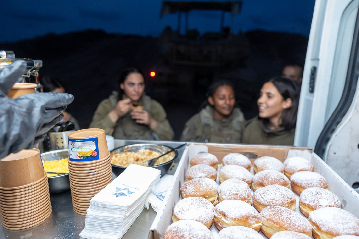 Soup, a doughnut, and a smile – energy for our female soldiers before heading out.